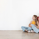 Family three woman sitting on floor, looking at copy space - PhotoDune Item for Sale