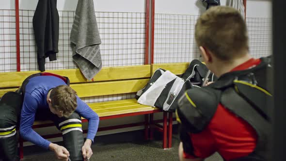 Ice Hockey Players in Changing Room alt