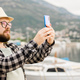 Traveller millennial man taking pictures of luxury yachts marine during sunny day - travel and - PhotoDune Item for Sale