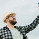 Traveller millennial man taking selfie outdoor on sky background - travel and summer concept - PhotoDune Item for Sale