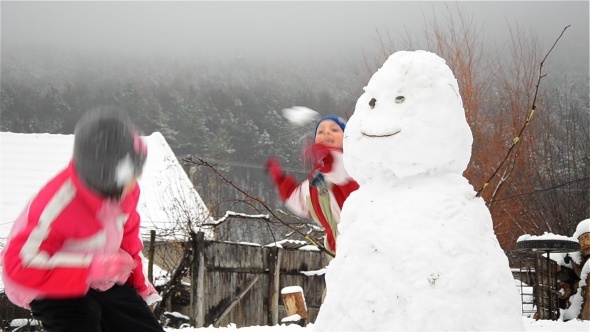 Kids Playing With Snow