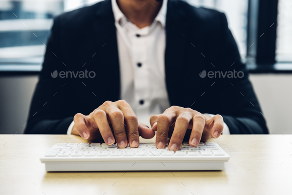 Man hand using laptop or computor searching for information