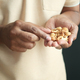 young men eating cashew nuts  - PhotoDune Item for Sale