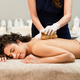 Faceless beautician massaging back of relaxed woman - PhotoDune Item for Sale