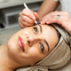 Female client having eyebrows treatment in a salon - PhotoDune Item for Sale