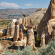 Unique geological rock formations Fairy Chimneys in Cappadocia. Popular touristic area in Turkey - PhotoDune Item for Sale