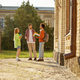 Multiracial group of teen students gossip in university campus backyard - PhotoDune Item for Sale