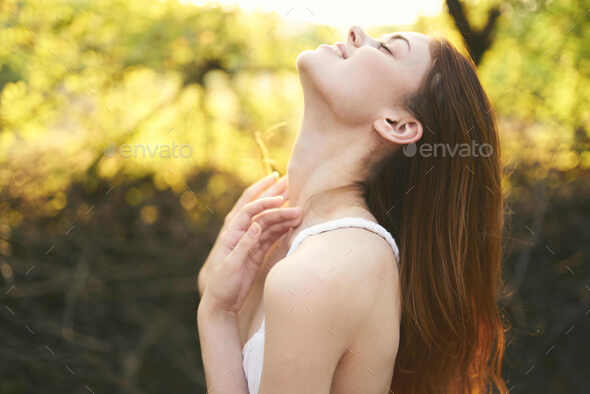 attractive woman in nature posing sun rest Stock Photo by shotprime