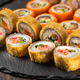 Japanese salmon sushi - Sushi menu norimaki and uramaki. Asian cuisine concept - PhotoDune Item for Sale