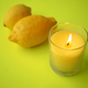 yellow color candle and lemon on black background  - PhotoDune Item for Sale
