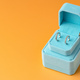 Blue jewelry box on yellow background close up - PhotoDune Item for Sale