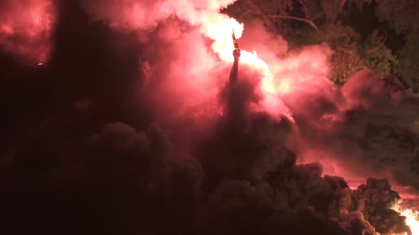 Football Fan with Fire Torch and Smoke