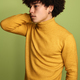 Serious black boy with Afro hairstyle in studio - PhotoDune Item for Sale
