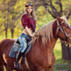 Beautiful girl riding horse on autumn field - PhotoDune Item for Sale
