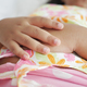 a child sleeping in bed, selective focus on hand  - PhotoDune Item for Sale