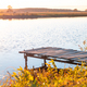 Wooden pier on the river. Autumn, sunset - PhotoDune Item for Sale