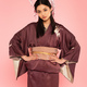 Young asian woman in traditional clothes holding hands on hips isolated on pink - PhotoDune Item for Sale