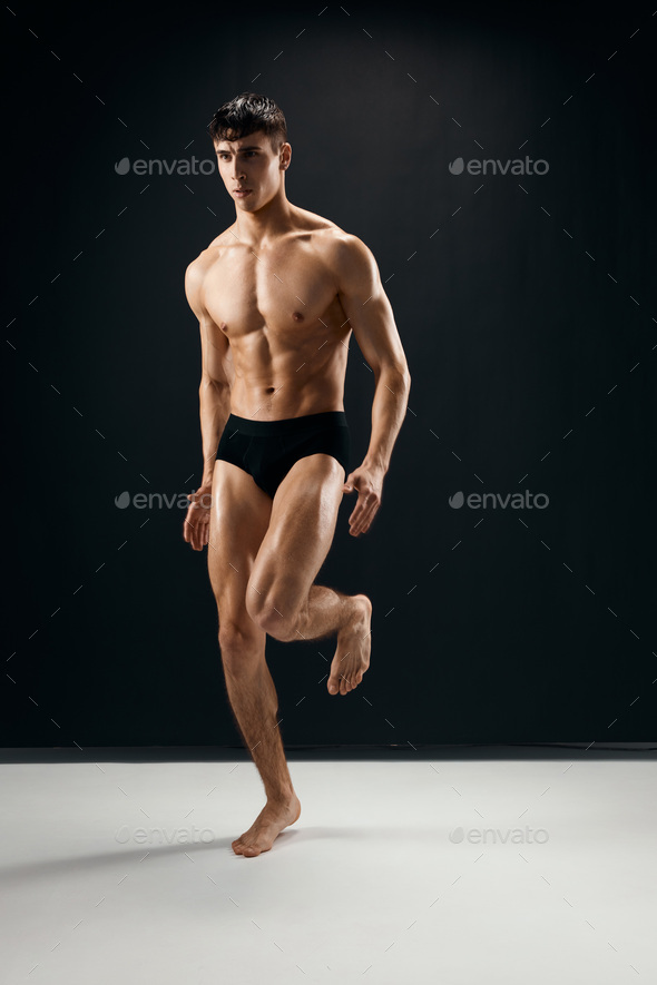 Premium Photo | Muscular man african bodybuilder. man posing on a dark gym  background. handsome man shows health and perfect shape.