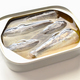 Canned sardines in oil on the table. - PhotoDune Item for Sale
