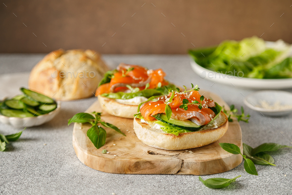 Salmon sandwiches with cream cheese, fresh romaine lettuce and cucumber ...