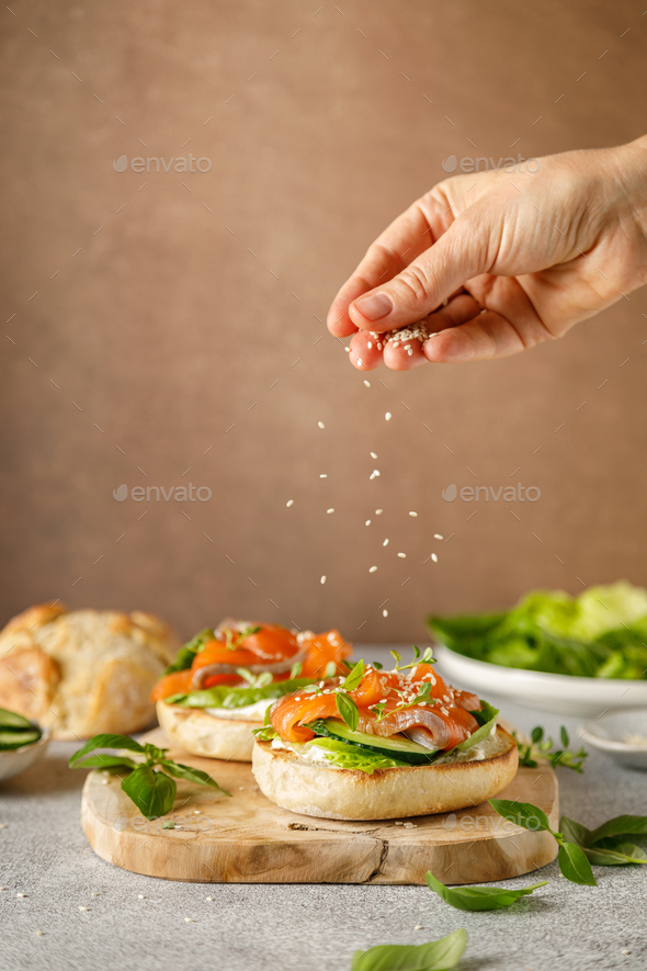 Salmon sandwiches with cream cheese, fresh romaine lettuce and cucumber ...