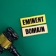 judge&#39;s gavel and colored paper with the words Eminent Domain - PhotoDune Item for Sale