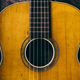Closeup of wooden acoustic guitar from above.  - PhotoDune Item for Sale