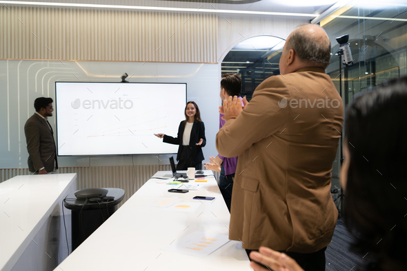 Business people having a meeting and present in a conference room at ...