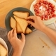 women&#39;s hands make a breakfast of toasted triangles - PhotoDune Item for Sale