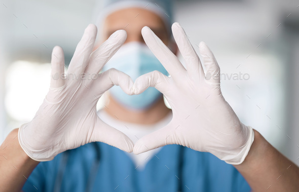 Male doctor, hands and heart in closeup with thank you for support and trust with healthcare. Medic