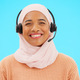 Call center, woman face and isolated on blue background for agent, consultant or muslim telemarketi - PhotoDune Item for Sale