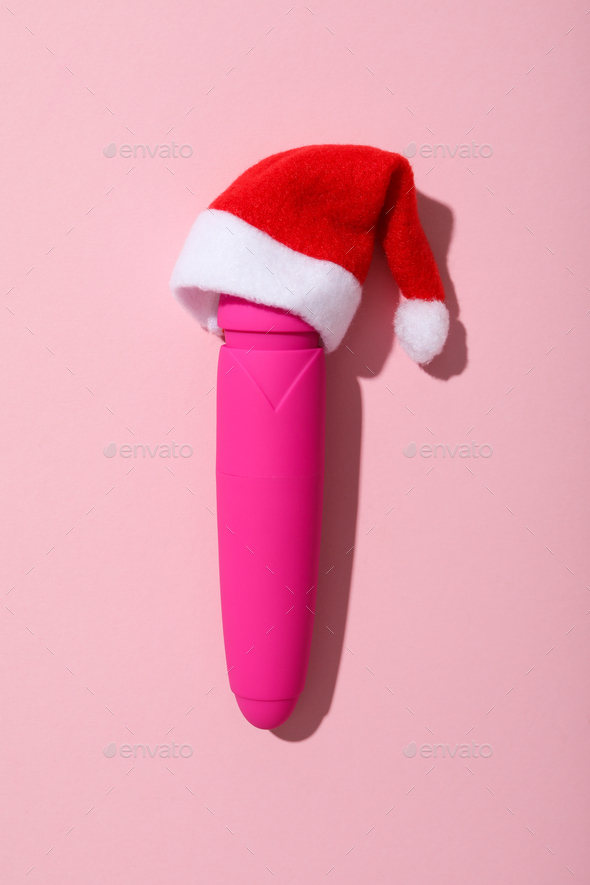 Sex toys with Christmas Santa hat top view