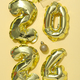 New Year 2024 with golden balloons on a light background - PhotoDune Item for Sale