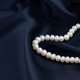 pearls on a silk background, heart shape - PhotoDune Item for Sale