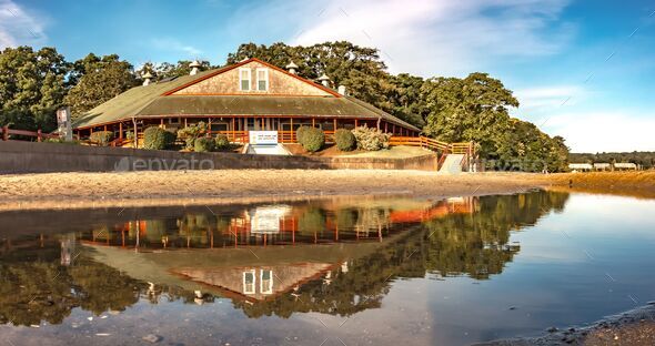 The Goddard Memorial State Park by the sea surrounded by trees in ...