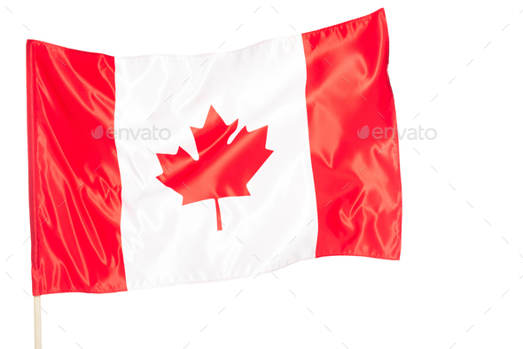 Canadian flag with red maple leaf isolated on black
