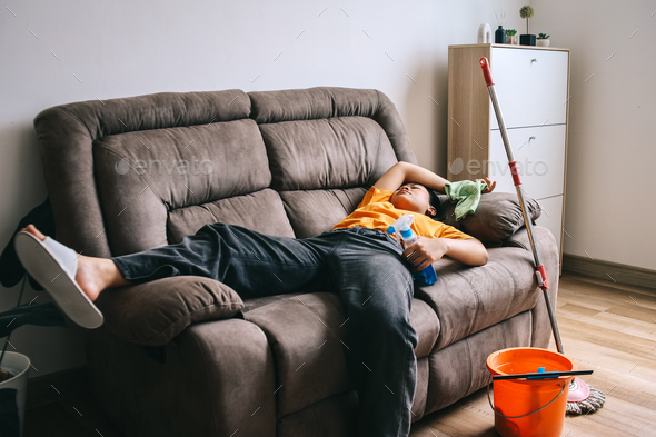 Exhausted Woman Falling Asleep While Cleanup The Room