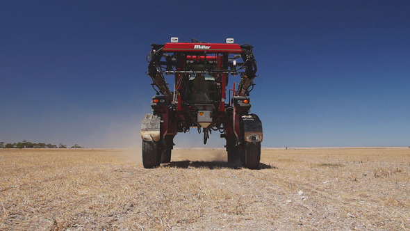 Agricultural Spryer On Farm Field