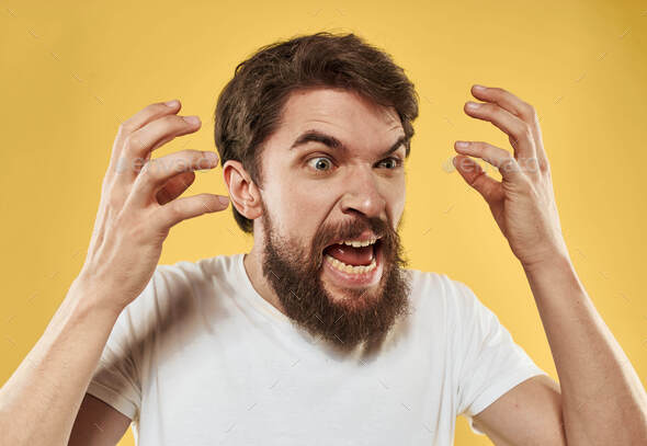 Man with beard open mouth emotions and stress irritability