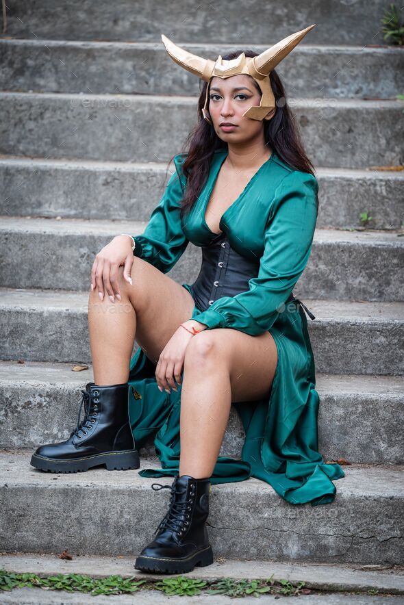 Female cosplayer dressed up as Loki - Stock Photo - Images