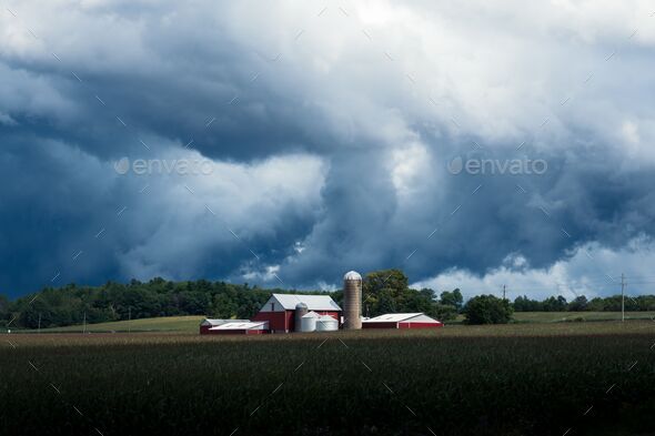 Severe Storms Traveling Over Canadian Farmland - Stock Photo - Images