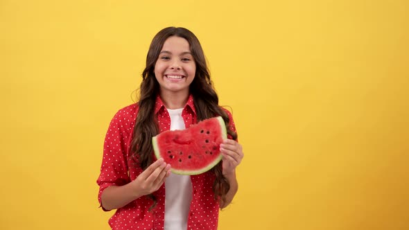 Happy Child Turning with Water Melon Slice on Yellow Background Vitamin alt