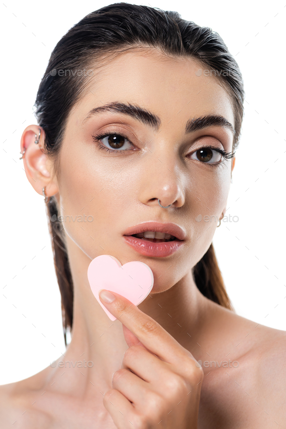 Heart-shaped sponge, close up stock photo