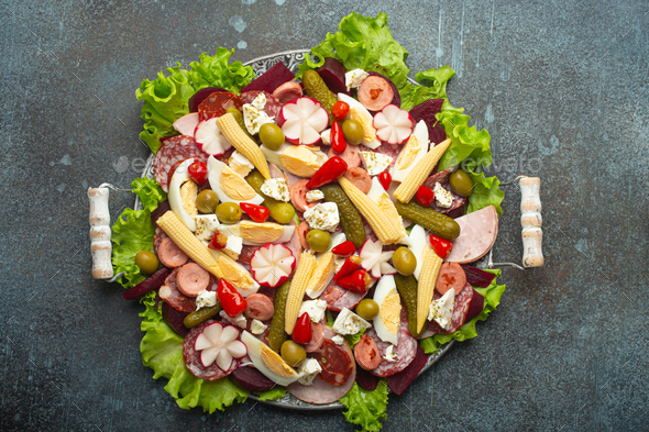 Fiambre, salad of Guatemala, Mexico and Latin America, served on large plate top view. Festive dish - Stock Photo - Images