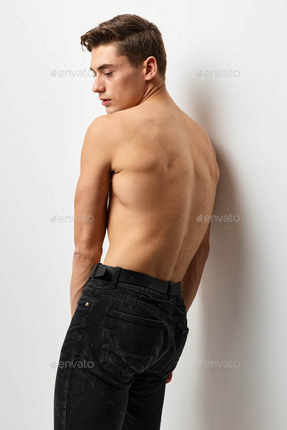 Male nude posing in studio. Attractiveness model lifestyle Stock Photo
