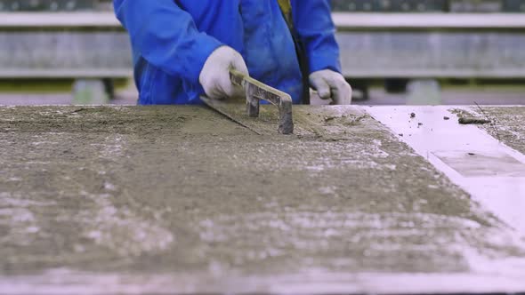 Slurry is being formed by worker