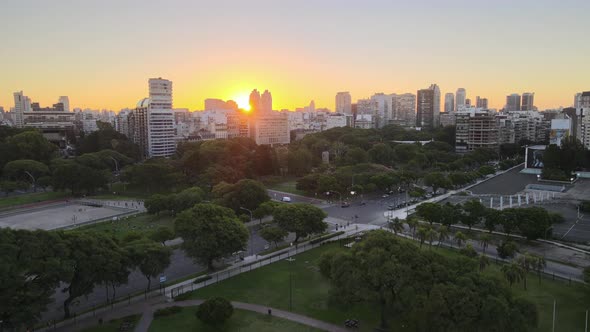 Jib up rising over Recoleta neighborhood squares at golden hour with sun setting behind Recoleta bui alt