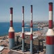 Red and White Chimney Pipes of Power Station Generating Electricity Aerial Close Up Shot - VideoHive Item for Sale
