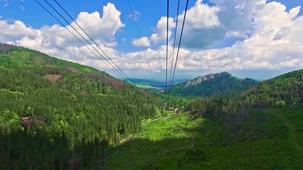 Travel by cable car from Kasprowy Wierch in the summer, Tatras alt
