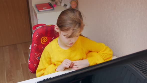 The Pupil Is Studying At The Computer alt